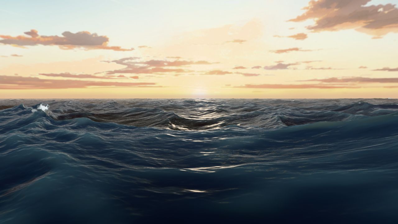 Sunset reflected across the waves of Poseidon's real-time ocean simulation